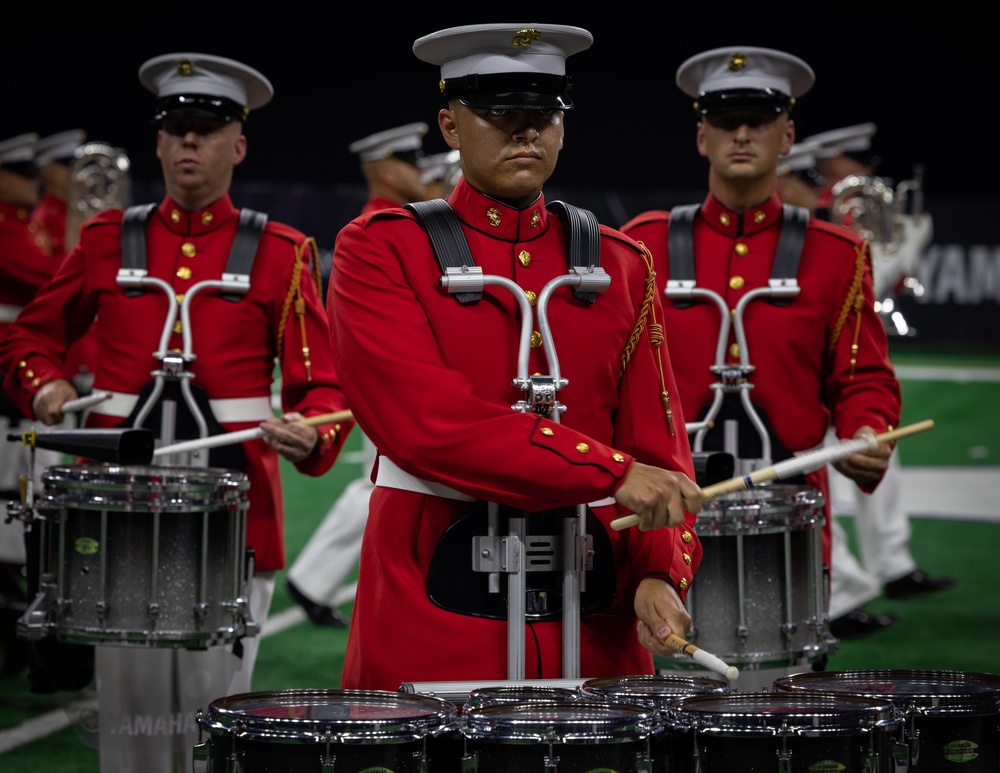 Marines with “The Commandant’s Own,” U.S. Marine Drum and Bugle Corps, perform for 22,000 plus guests at the Drum Corps International in Indianpolis.