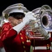 Marines with “The Commandant’s Own,” U.S. Marine Drum and Bugle Corps, perform for 22,000 plus guests at the Drum Corps International in Indianpolis.