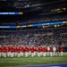 Marines with “The Commandant’s Own,” U.S. Marine Drum and Bugle Corps, perform for 22,000 plus guests at the Drum Corps International in Indianpolis.