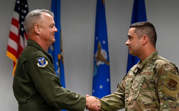 4th AF commander coins airmen for excellence