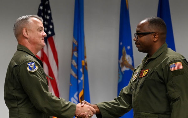 4th AF commander coins airmen for excellence