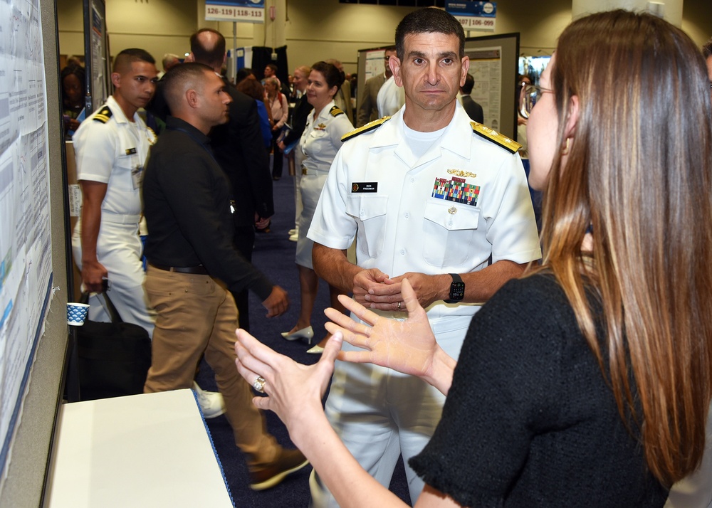 Navy Deputy Surgeon General visits with NAMRU San Antonio Researchers at MHSRS 2023