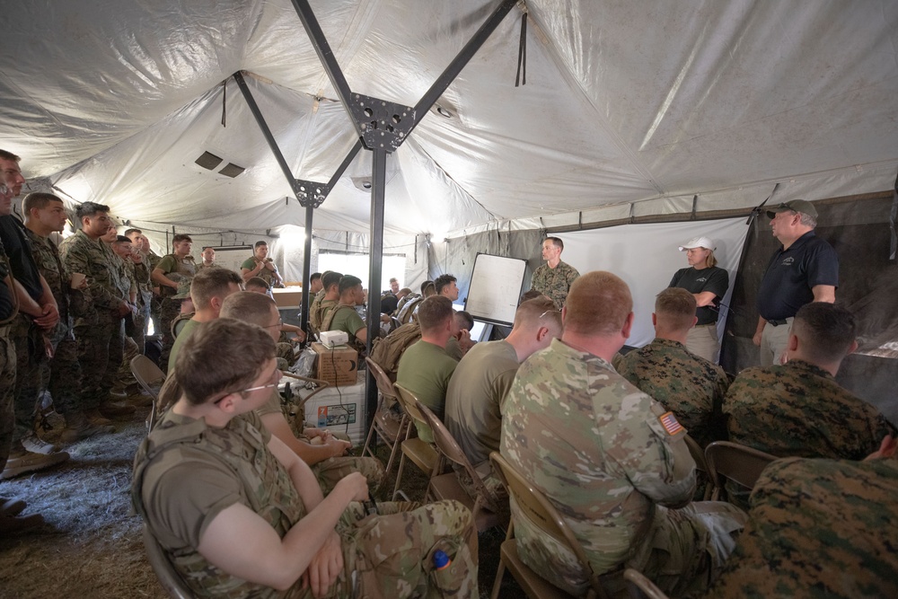 Marines practice search and retrieval operations alongside civilian search team during Northern Strike 2023