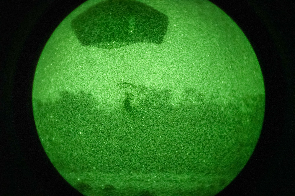 U.S. Soldiers conduct a high-performance night jump during Talisman Sabre 2023