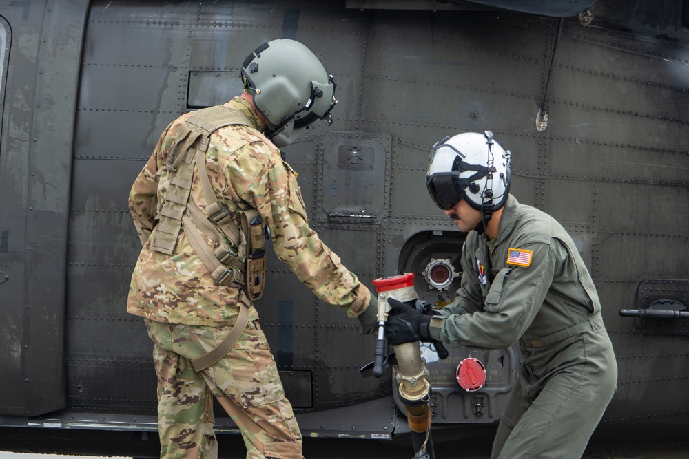 Aerial Support Masters: VMGR-152 Refuels UH-60 Black Hawk helicopters