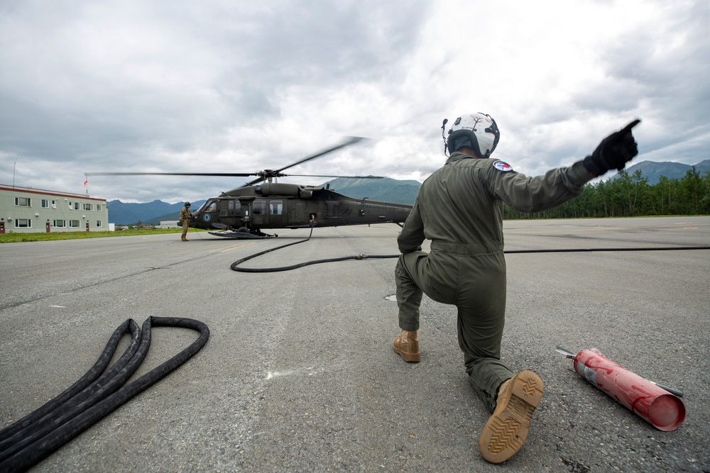 Aerial Support Masters: VMGR-152 Refuels UH-60 Black Hawk helicopters