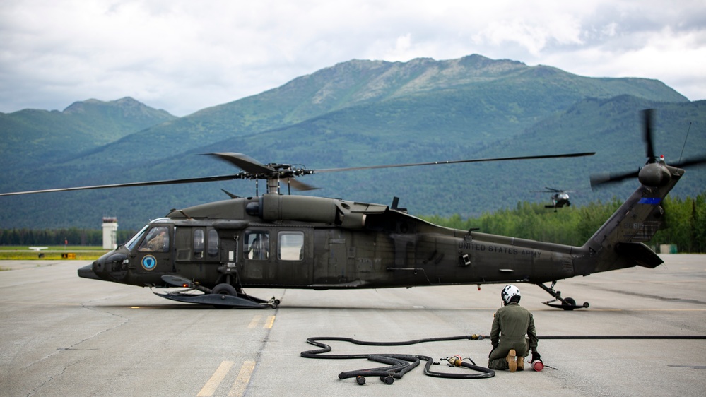 Aerial Support Masters: VMGR-152 Refuels UH-60 Black Hawk helicopters