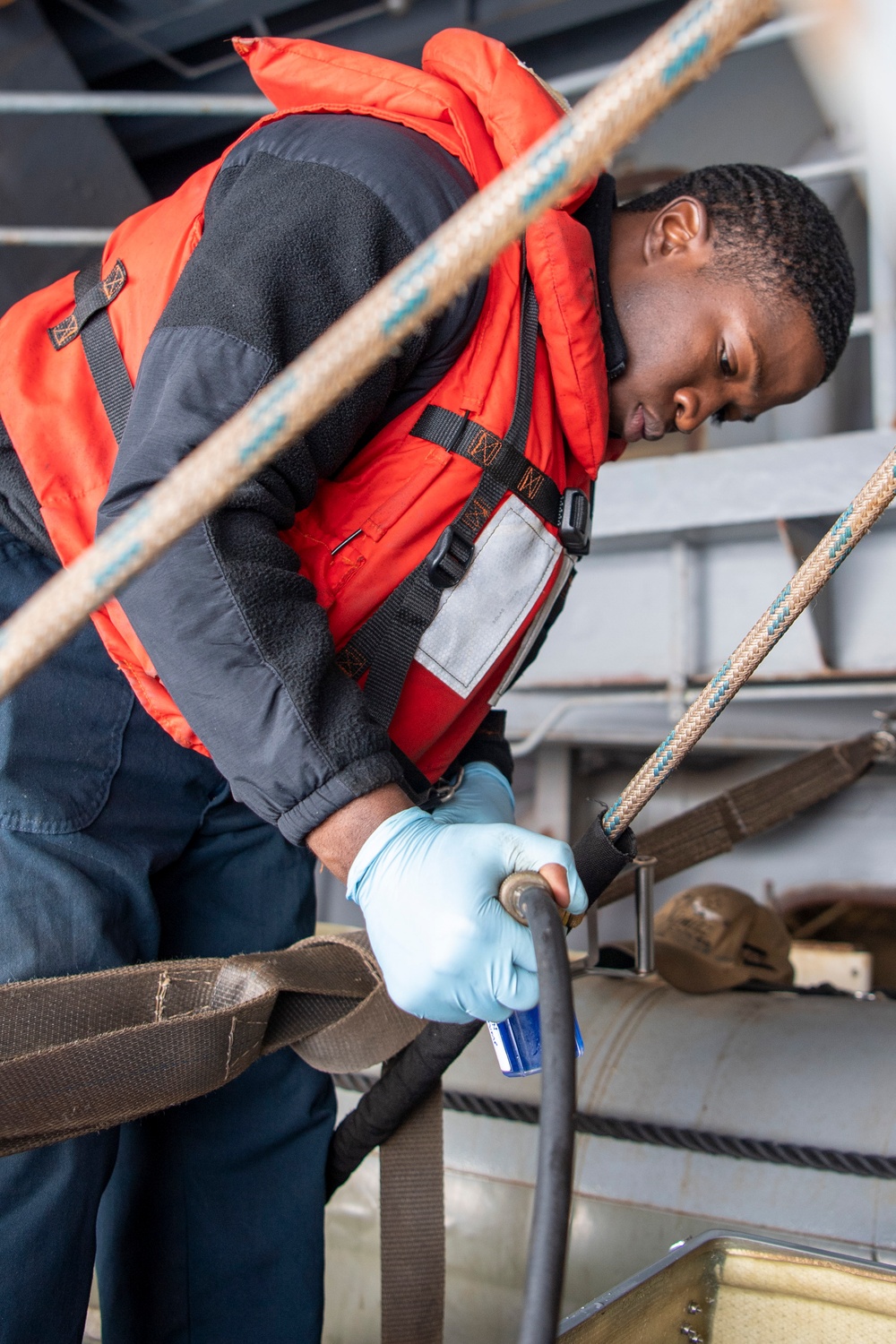 Sailors Conduct Maintenance