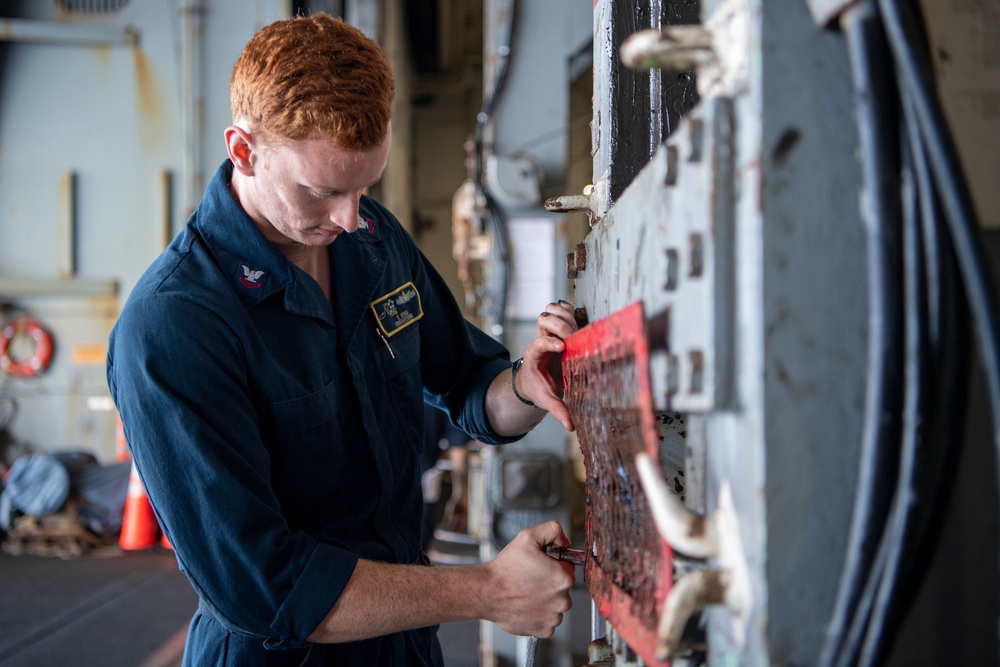 Sailors Conduct Maintenance