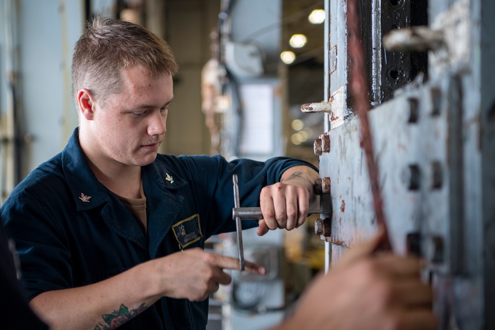 Sailors Conduct Maintenance