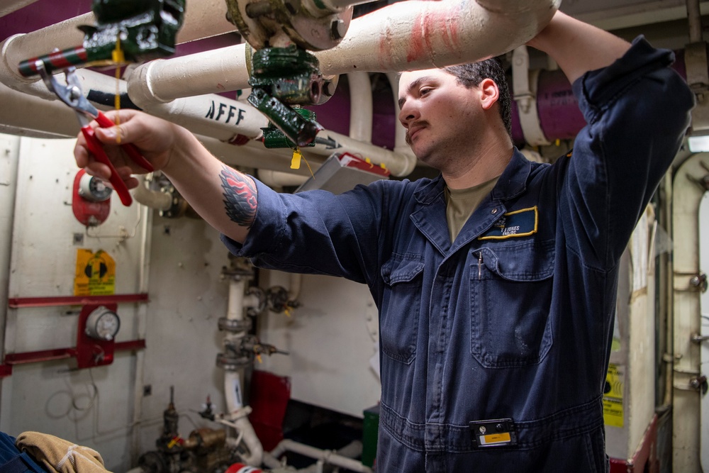 Sailors Conduct Maintenance