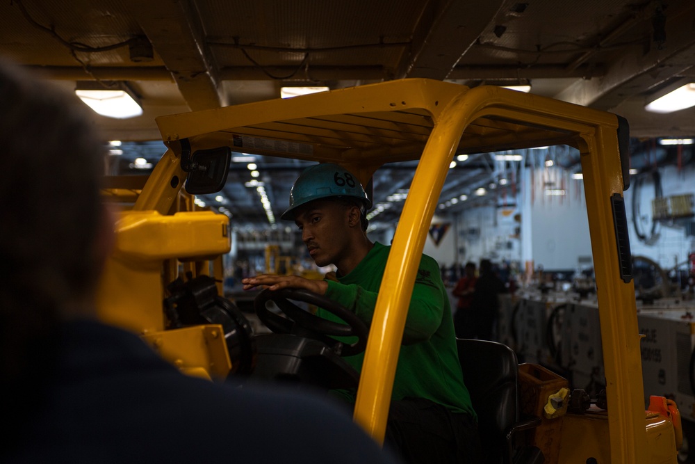 Sailor Drives Forklift