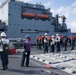 USS Ralph Johnson (DDG 114) conducts a replenishment-at-sea with the USNS Matthew Perry (T-AKE-9).