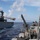 USS Ralph Johnson (DDG 114) conducts a replenishment-at-sea with the USNS Matthew Perry (T-AKE-9).