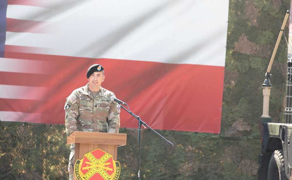 Command Sgt. Maj. Kirk L. Ray accepts USAG Poland colors