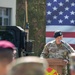 Command Sgt. Maj. Kirk L. Ray accepts USAG Poland colors