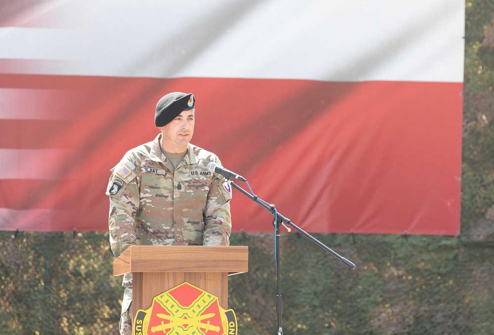 Command Sgt. Maj. Kirk L. Ray accepts USAG Poland colors