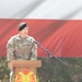 Command Sgt. Maj. Kirk L. Ray accepts USAG Poland colors