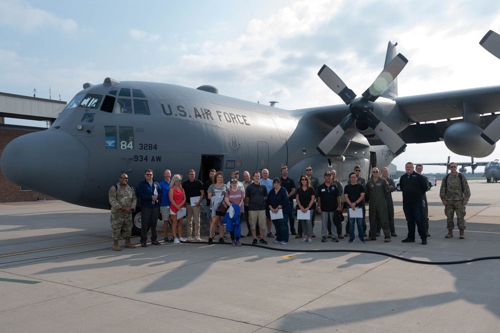 Rare Air: Civilian employers fly in a C-130 during the 934 AW's Employers Day