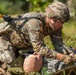 2nd Lt. Adam Ardigo secures a patient to a sled