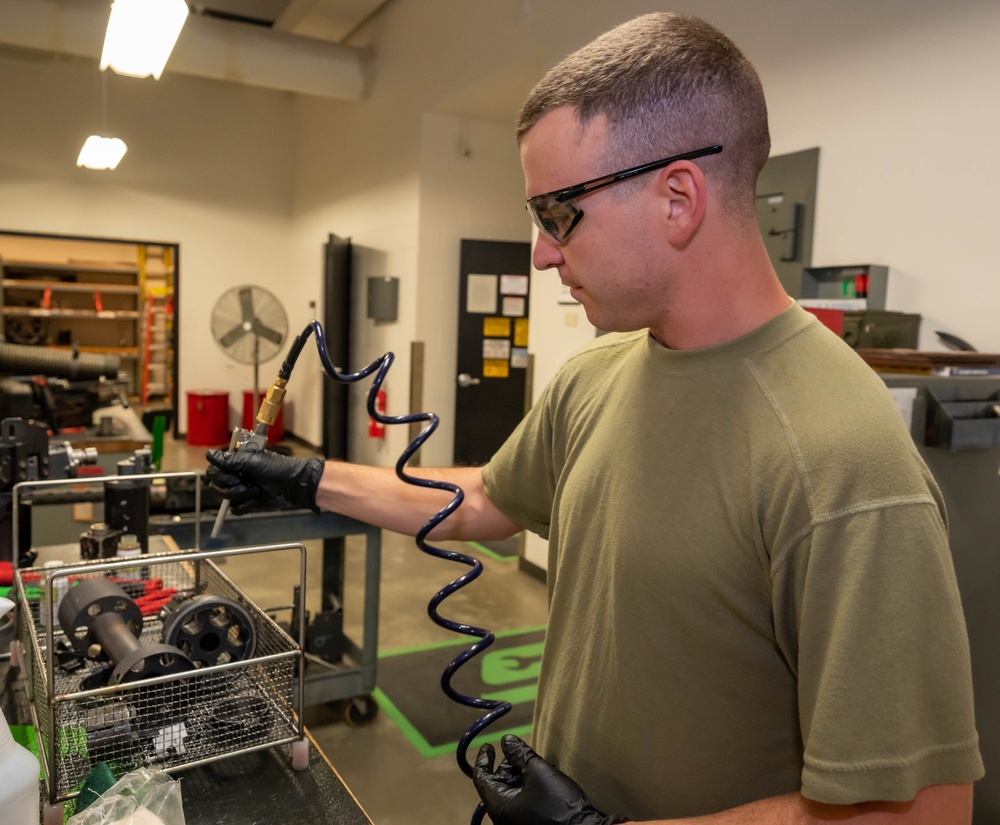 920th weapons specialists perform after fire inspections