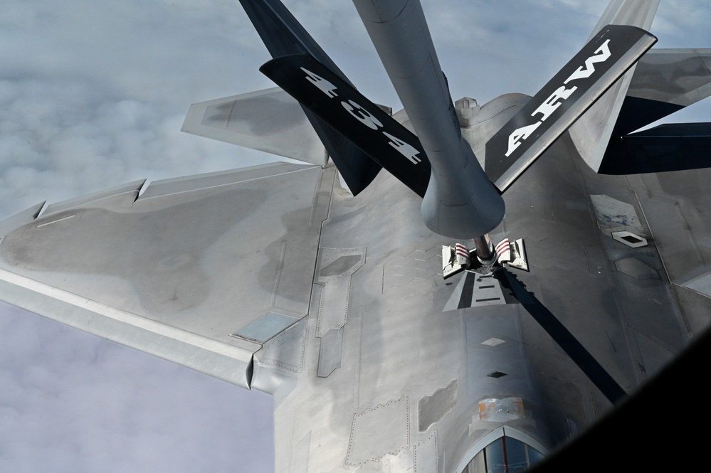 KC-135 refuels F-22 over Alaska