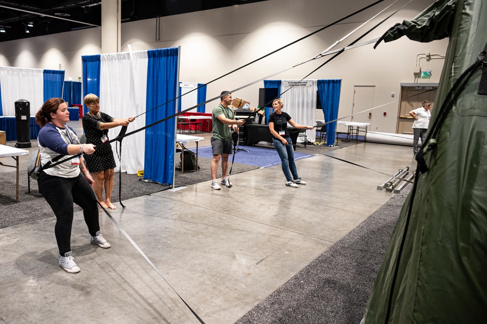 Closing Time – USAMMDA team wraps MHSRS exhibits as symposium drawing to close