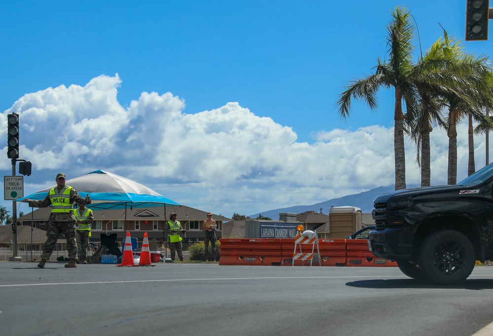 Hawaii National Guard service members of Joint Task Force 50 direct traffic in Lahaina