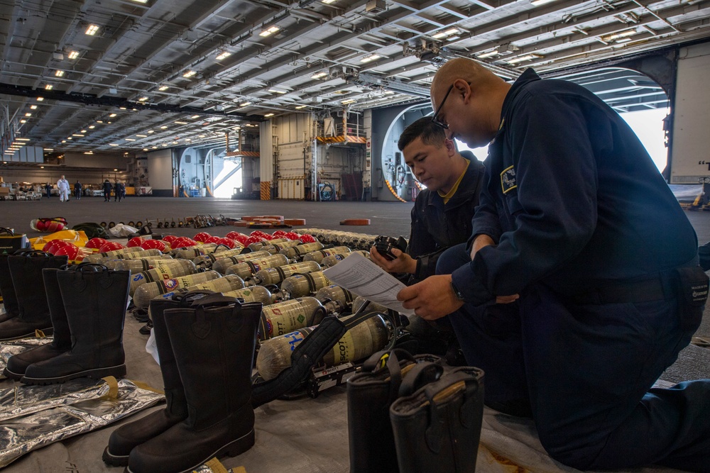 Sailors Inspect Equipment