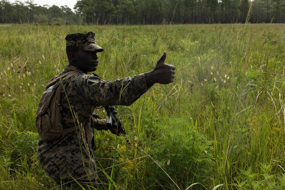 Midshipmen conduct battle drills and patrols with land navigation during CORTRAMID