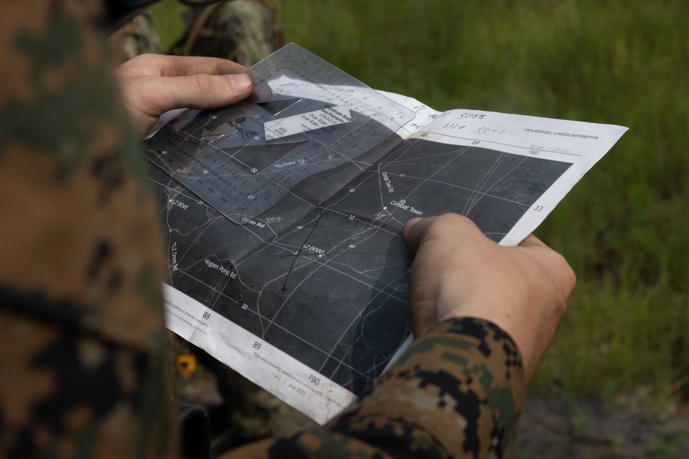 Midshipmen conduct battle drills and patrols with land navigation during CORTRAMID