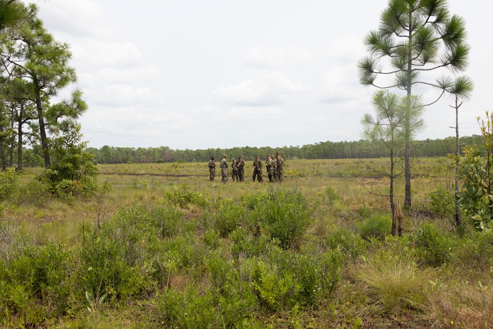 Midshipmen conduct battle drills and patrols with land navigation during CORTRAMID