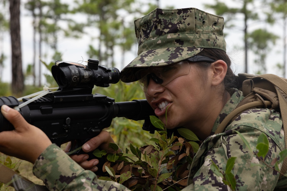 Midshipmen conduct battle drills and patrols with land navigation during CORTRAMID