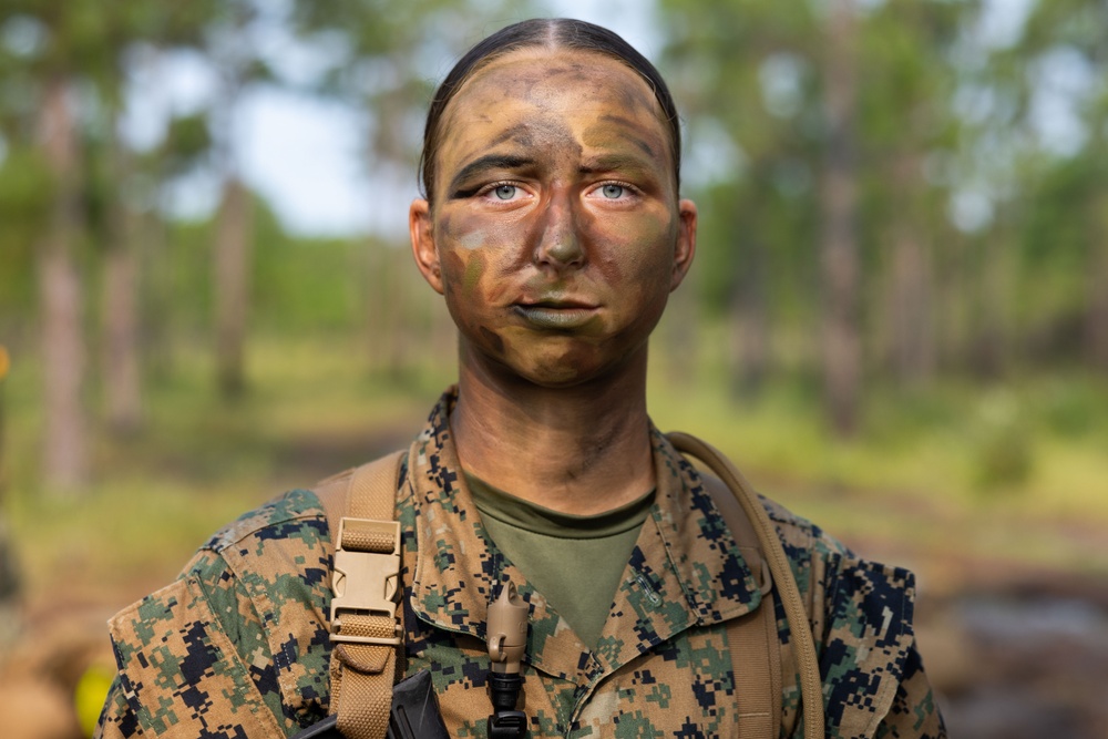 Midshipmen conduct battle drills and patrols with land navigation during CORTRAMID