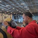 Sailors Aboard George Washington Don Firefighting Equipment