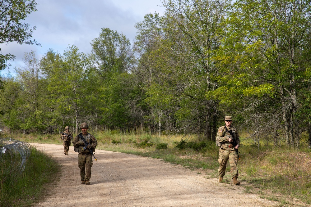 Soldiers with the 1431st Engineer Company set up a concertina wire obstacle during Exercise Northern Strike 2023