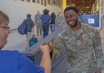 11th Airborne Division Soldiers Welcome Students Back to School in Anchorage, Fairbanks [5 of 10]