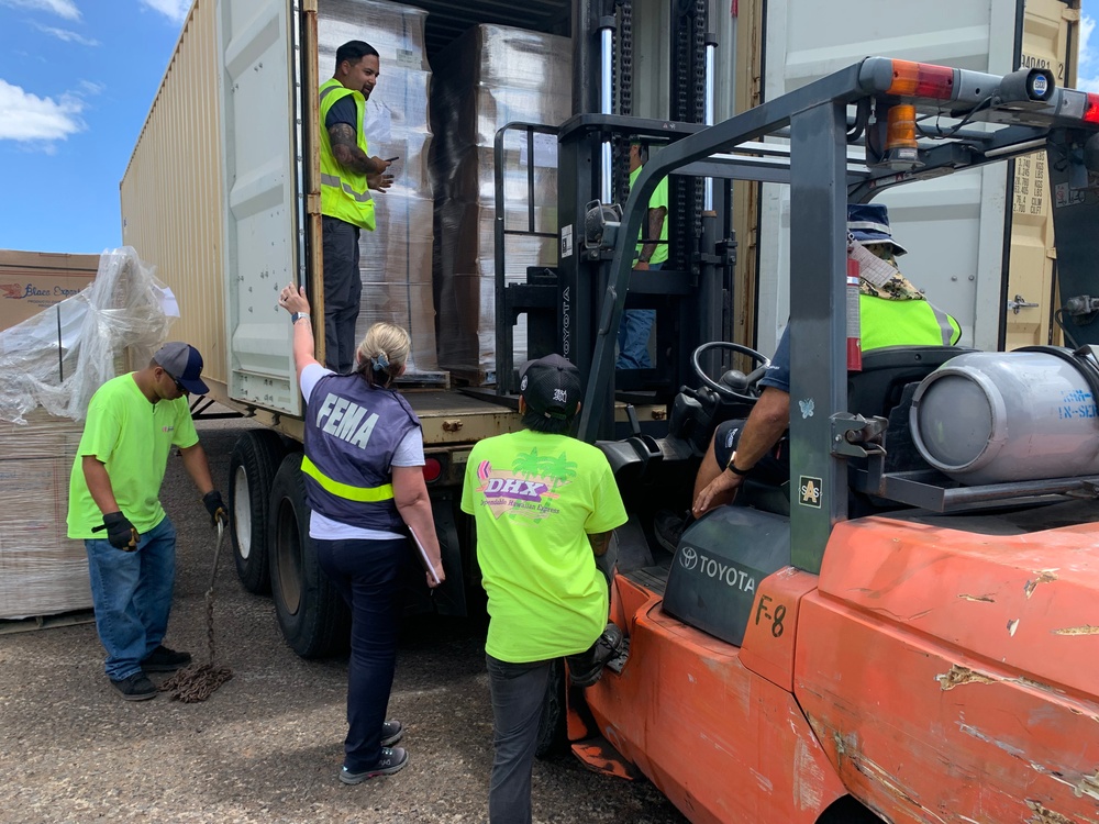 FEMA Personnel Sort Supplies For Hawaii Wildfire Survivors