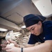 USS Ronald Reagan (CVN 76) Sailors prepare and serve food