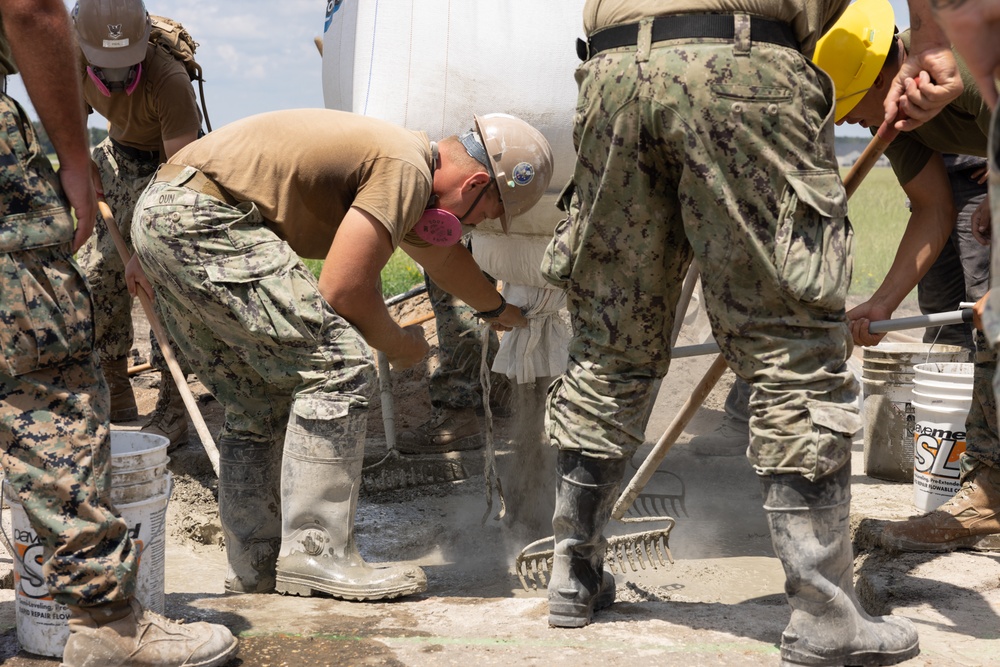 Marine Wing Support Squadron (MWSS) 272 works alongside Naval Mobile Construction Battalion 11 to conduct airfield damage repair