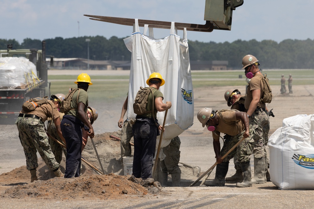 Marine Wing Support Squadron (MWSS) 272 works alongside Naval Mobile Construction Battalion 11 to conduct airfield damage repair