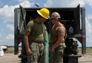 Marine Wing Support Squadron (MWSS) 272 works alongside Naval Mobile Construction Battalion 11 to conduct airfield damage repair