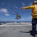 US Navy Helo Lands on USCGC Munro