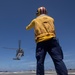 US Navy Helo Lands on USCGC Munro