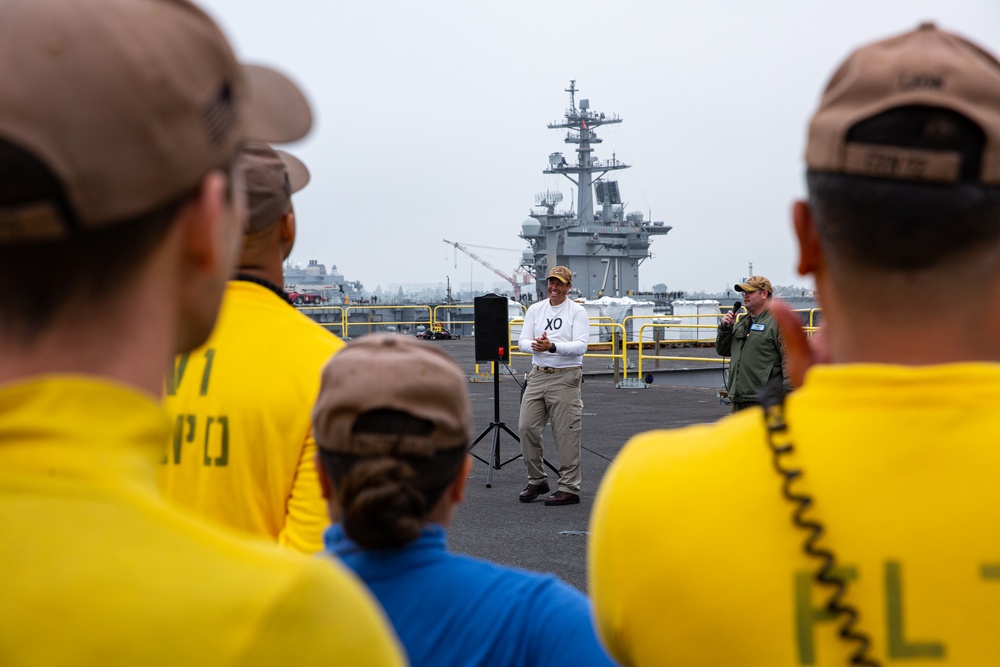 Capt. Baker gives remarks during farewell ceremony on Abraham Lincoln