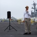 Capt. Baker gives remarks during farewell ceremony on Abraham Lincoln