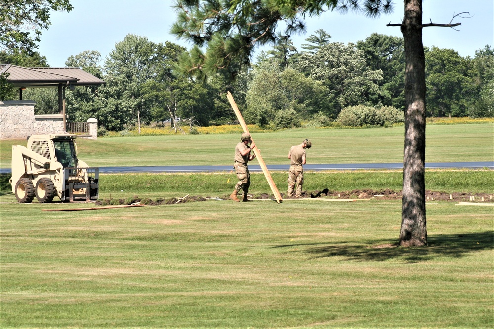 Army Reserve engineer unit training in CSTX 86-23-02 helps complete sidewalk project at Fort McCoy