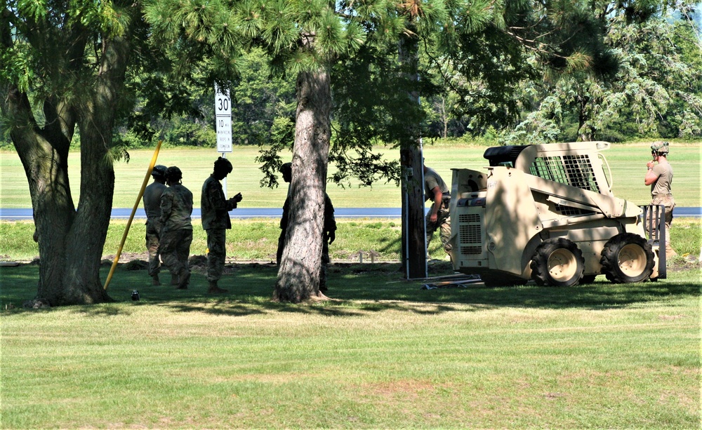 Army Reserve engineer unit training in CSTX 86-23-02 helps complete sidewalk project at Fort McCoy