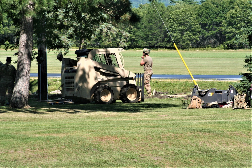 Army Reserve engineer unit training in CSTX 86-23-02 helps complete sidewalk project at Fort McCoy