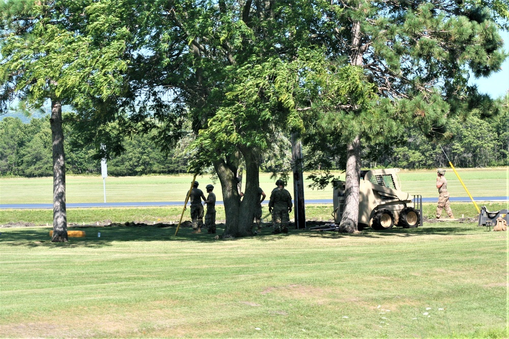 Army Reserve engineer unit training in CSTX 86-23-02 helps complete sidewalk project at Fort McCoy